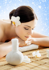 Obraz na płótnie Canvas Beautiful and healthy woman in a winter spa salon