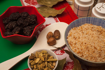 Cooking with nutmeg, prunes and cardamom. Nutmeg in menu for perfect dinner.