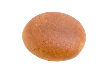 Round wheat rye bread on a light background