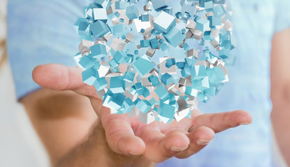 Businessman holding flying abstract sphere with shiny cube 3D re