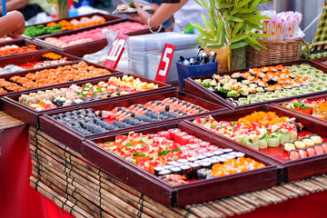 Sushi stall at the market food © sahachat
