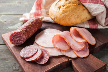 the cut sausage on a table, selective focus