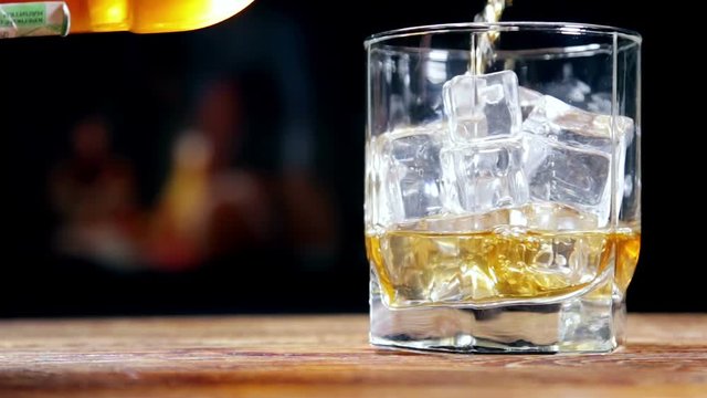 poured from a bottle of whiskey