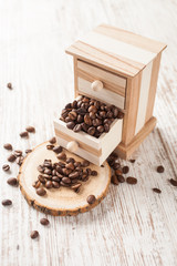 coffee grains in a box on a table, selective focus