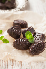 chocolates on paper  on a table, selective focus