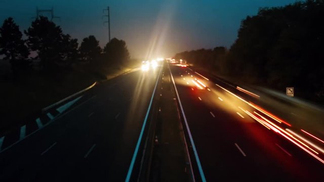 Night time lapse of a busy highway