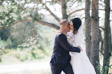 Fototapeta premium Happy bride and groom on their wedding day