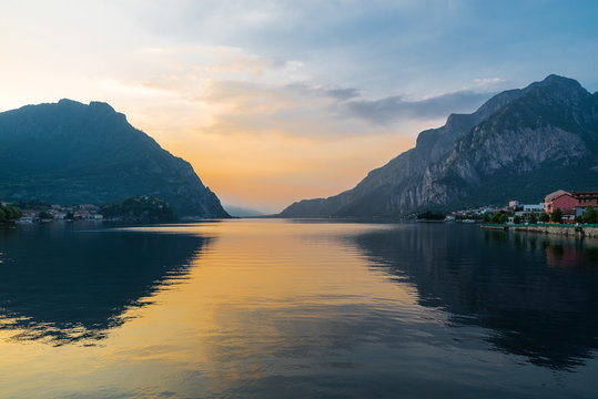 Lake Como at sunset, on the right the country of Lecco, to the left the lakeside of Malgrate, Italy 