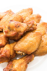 Grilled bbq chicken wing in white plate