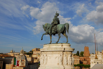 Vittorio Emanuele, first king of Italy, bronze equestrian statue with beautiful clouds