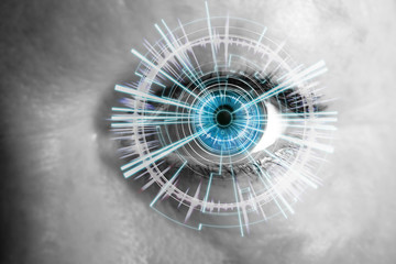 Eye of a woman with digital interface in front of it