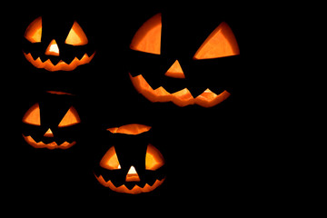 four halloween pumpkins wallpaper