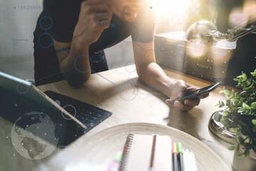 Man using VOIP headset with digital tablet computer docking smar