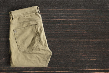 Pants on wooden background