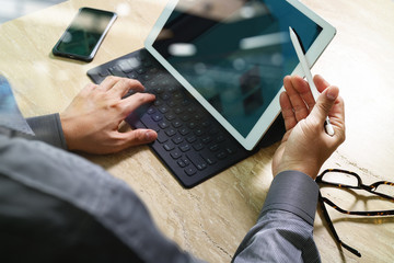 Businessman hand working concept. Photo investor working with ne