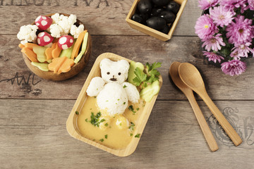 Creative idea for kids lunch or dinner. Bath with rice bear and cream soup. Mushrooms of radishes,...