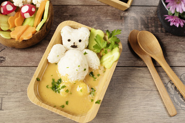 Creative idea for kids lunch or dinner. Children animal food. Bath with rice bear and cream soup. Mushrooms of radishes, shaped flowers from cucumbers and carrots. Fun and healt © sevdastancheva