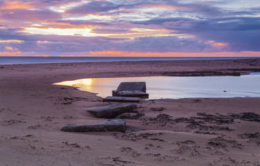Obraz premium Druridge Bay, Northumberland, England, UK, at dawn. Designated an area of outstanding natural beauty.