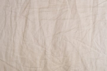 Background Pattern of Crumpled Brown Textile Texture