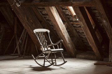 wooden rocking chair in attic - obrazy, fototapety, plakaty