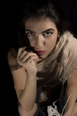 Young woman ,studio portrait on black background