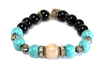 Rutile Quartz,Turquoise, Black Spinel Lucky stone bracelet with withe isolated background