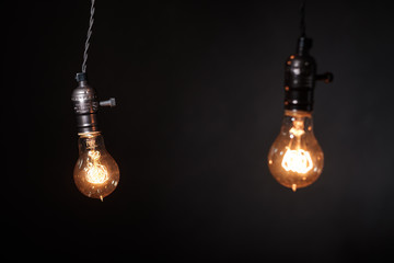 Light bulbs on black canvas background