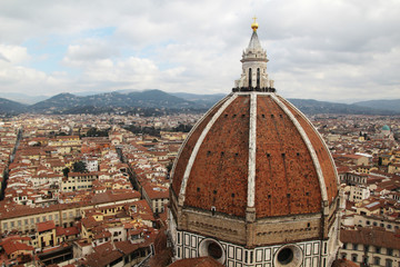 Fototapeta na wymiar View of the cupola of Il Duomo Cathedral from Campanile tower, Florence 