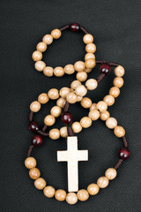 rosary on a dark background