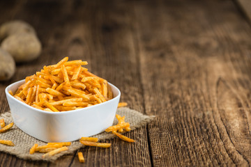 Bowl with Potato Sticks (close-up shot)