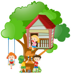 Children playing and painting treehouse