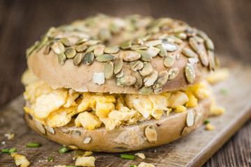 Fresh made Bagel with Scrambled Eggs (selective focus)