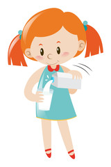 Girl pouring milk in glass