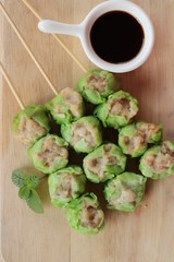 Chinese steamed dumpling with sauce is delicious.