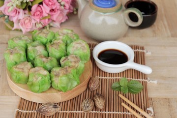 Chinese steamed dumpling with sauce is delicious.