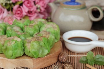 Chinese steamed dumpling with sauce is delicious.