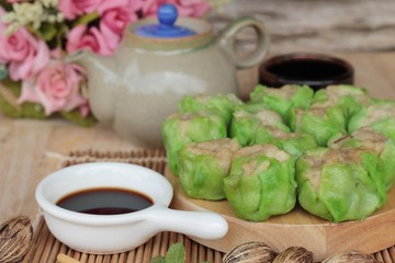 Chinese steamed dumpling with sauce is delicious.