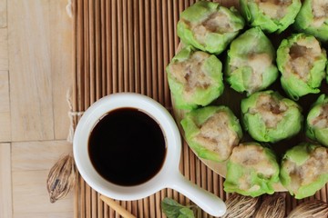 Chinese steamed dumpling with sauce is delicious.