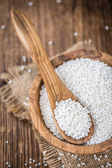 Tapioca on wooden background (selective focus)