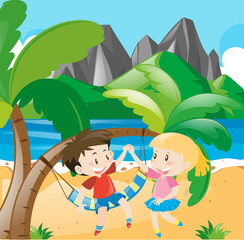 Obraz na płótnie Canvas Boy and girl on the beach