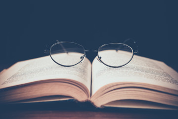 book with glasses