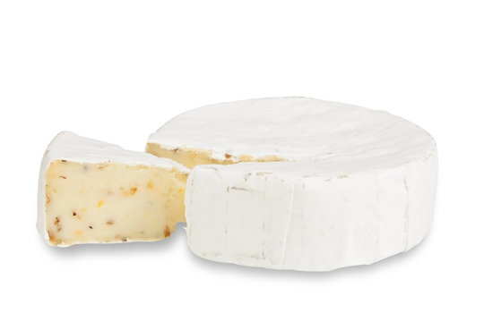Fresh brie cheese with white mold on a white background