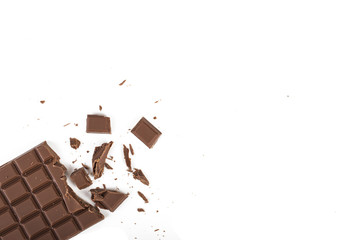 Cracked chocolate bar. On white, isolated background.
