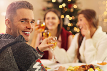 Group of friends celebrating Christmas