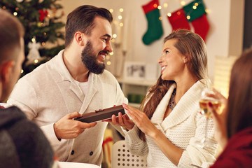 Group of friends celebrating Christmas