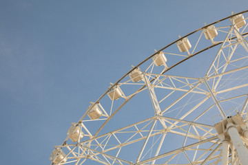 Ferris wheel on blue sky
