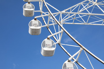 Ferris wheel on blue sky