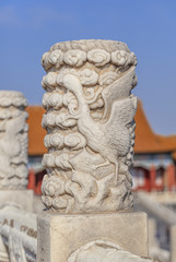 Ornate balustrade with ancient traditional building on background, Beijing, China