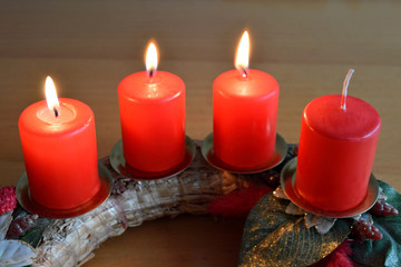Advent wreath with three burning candles