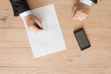 Businessman signing